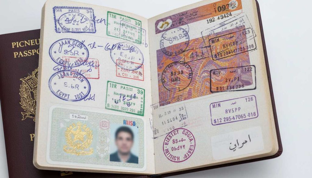 Close-up of a passport with stamps and endorsements